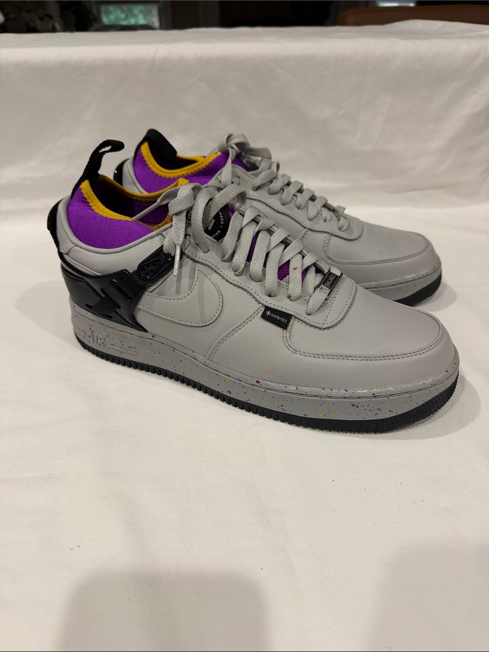 Nike Air Low-Top Sneakers in Gray with Purple and Yellow Accents